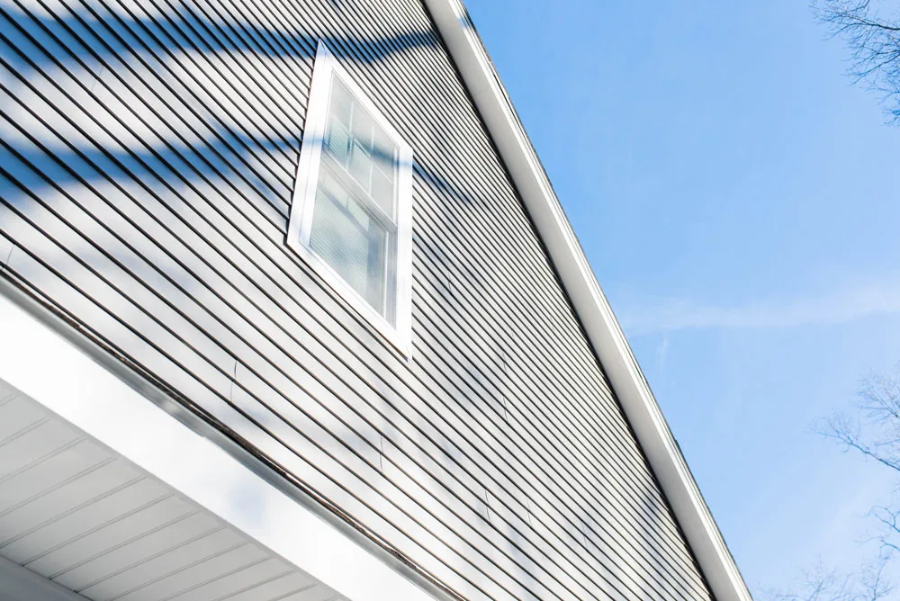New window set into horizontal exterior siding